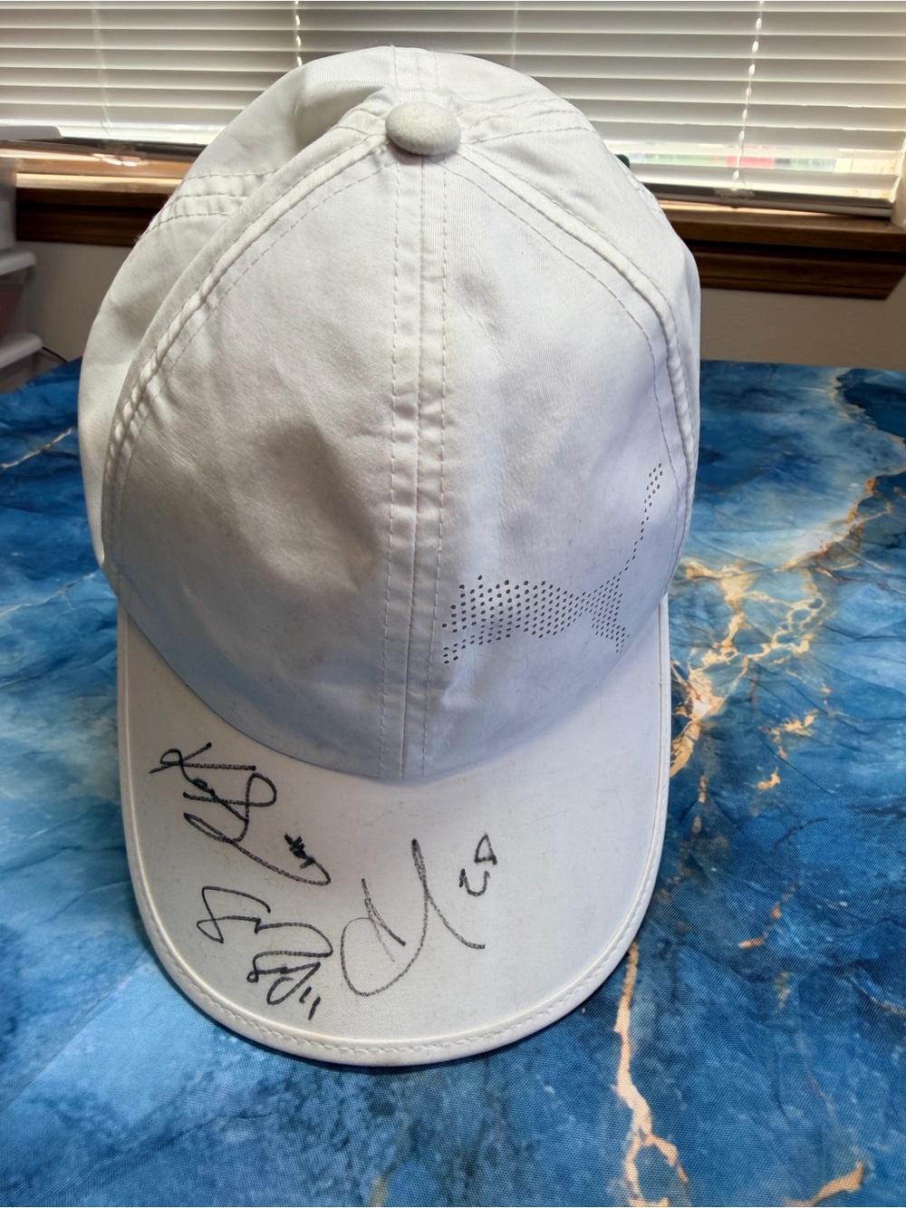 Signature hat Women’s Golf stars